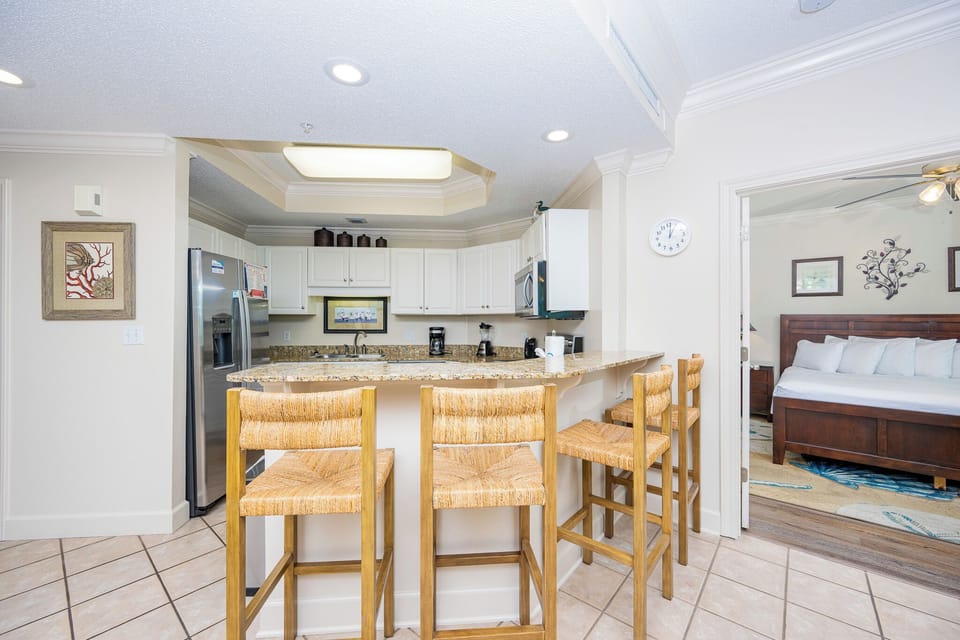 Sip your morning coffee at the breakfast bar and get ready for a day of adventure in this stylish space