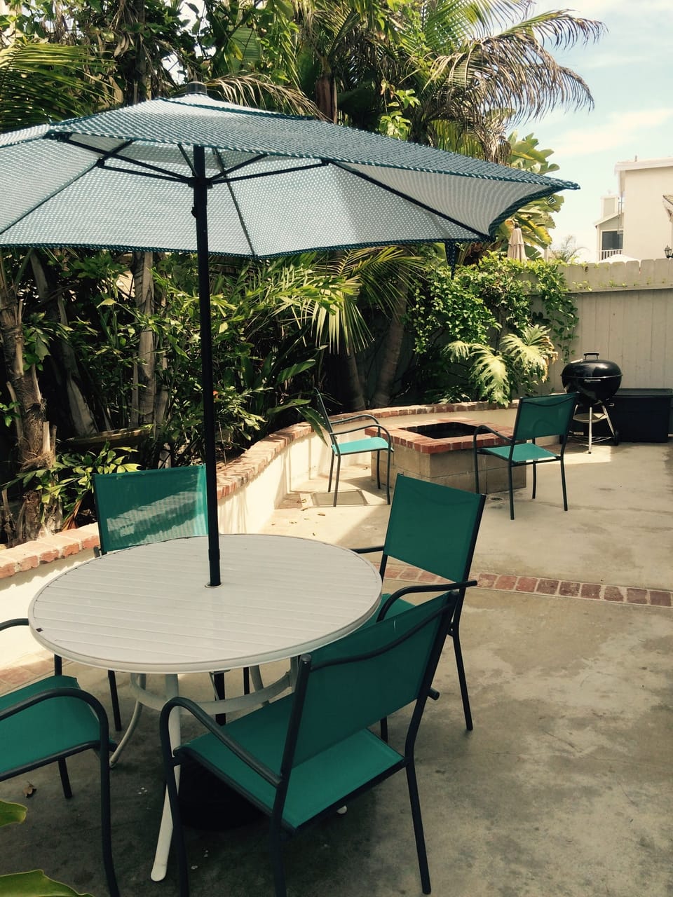 Relax in the shade on the private back patio. (Unit A use only) 