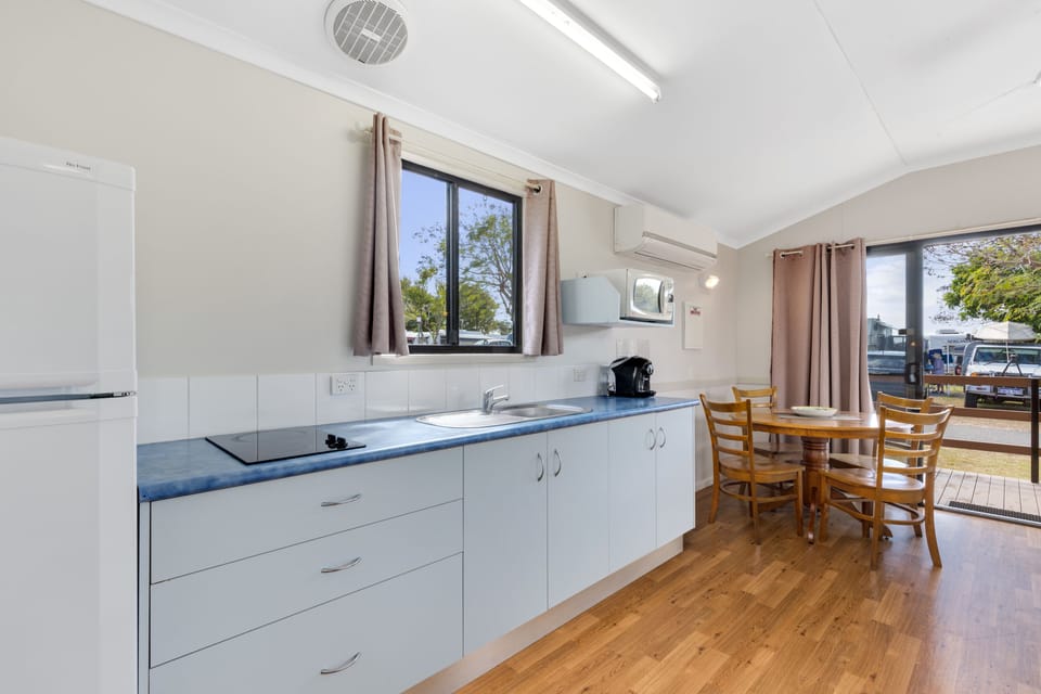 Ensuite Cabin | Private kitchen | Coffee/tea maker, full-size fridge, microwave, stovetop