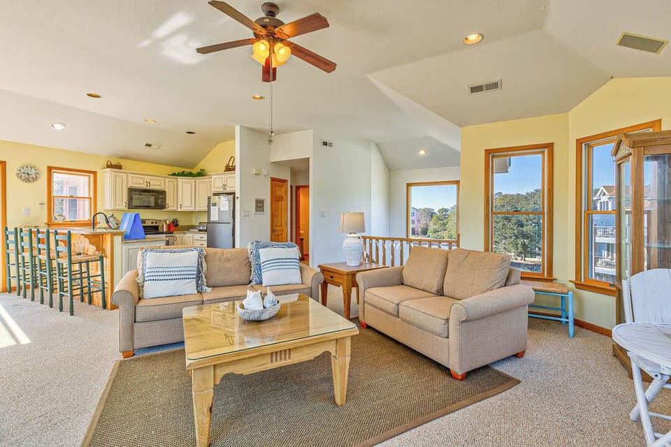 Top-Level Living Room with Deck Access