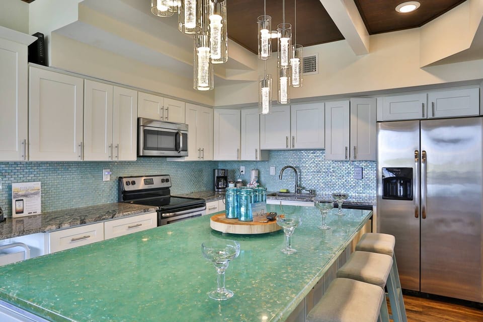 Fully Equipped Kitchen with Stainless appliances.  A starter kit with paper products and soap included.