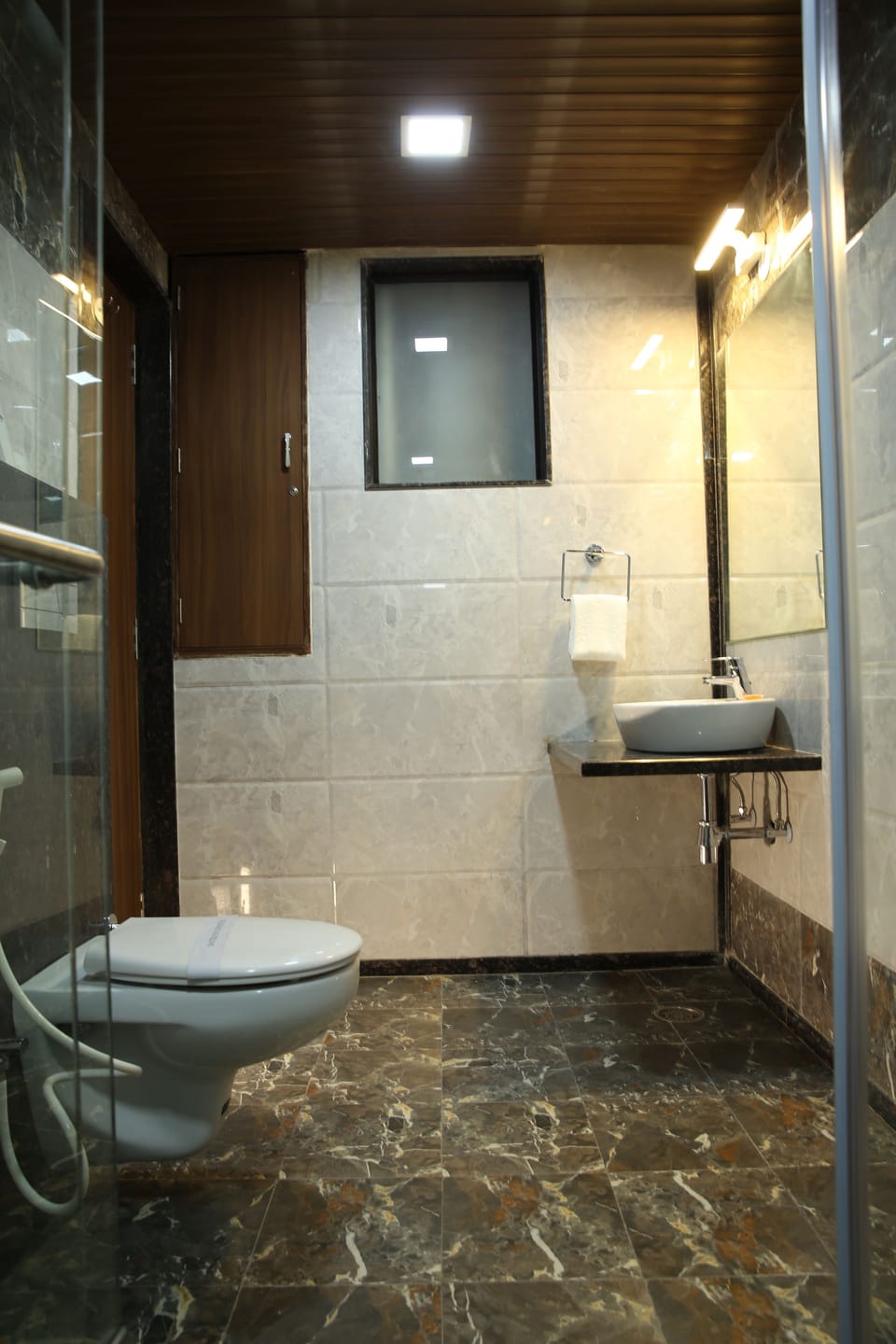 Shower, rainfall showerhead, designer toiletries, hair dryer