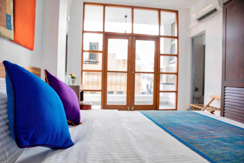 Standard Queen with balcony | Premium bedding, free WiFi