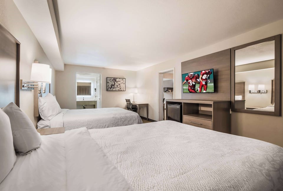 Room, 2 Queen Beds, Non Smoking | Premium bedding, blackout drapes, iron/ironing board