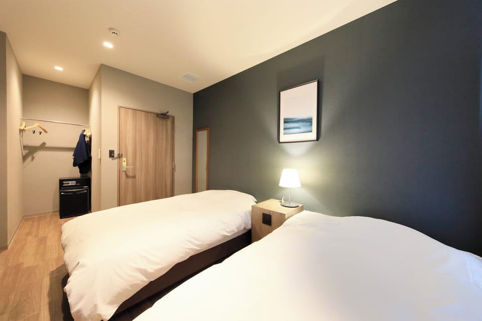 Standard Twin Room, 2 Twin Beds, Non Smoking, Private Bathroom | 1 bedroom, in-room safe, WiFi (free), individually decorated