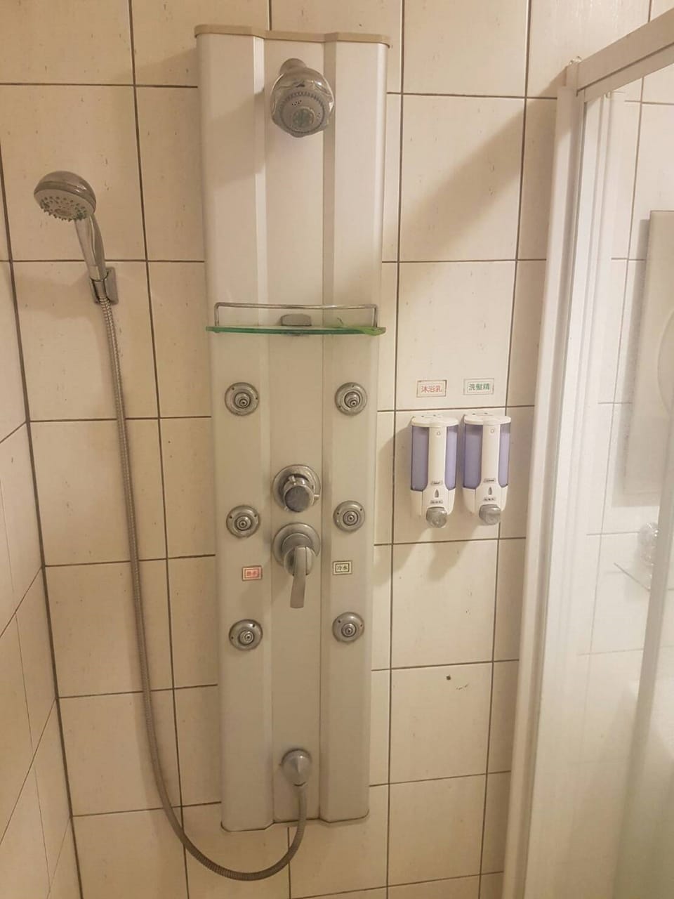 Shower, free toiletries, hair dryer, slippers