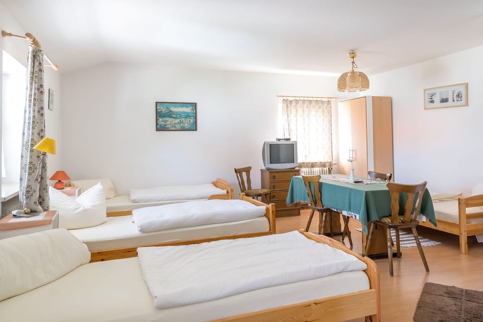 Triple Room | Desk, iron/ironing board, WiFi (free), bed sheets
