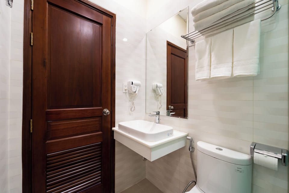 Shower, hydromassage showerhead, designer toiletries, hair dryer