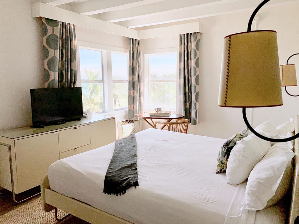 Blackout drapes, iron/ironing board, bed sheets