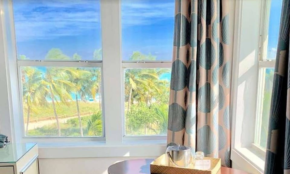 Deluxe Room, 1 King Bed, Balcony, Ocean View | Blackout drapes, iron/ironing board, bed sheets