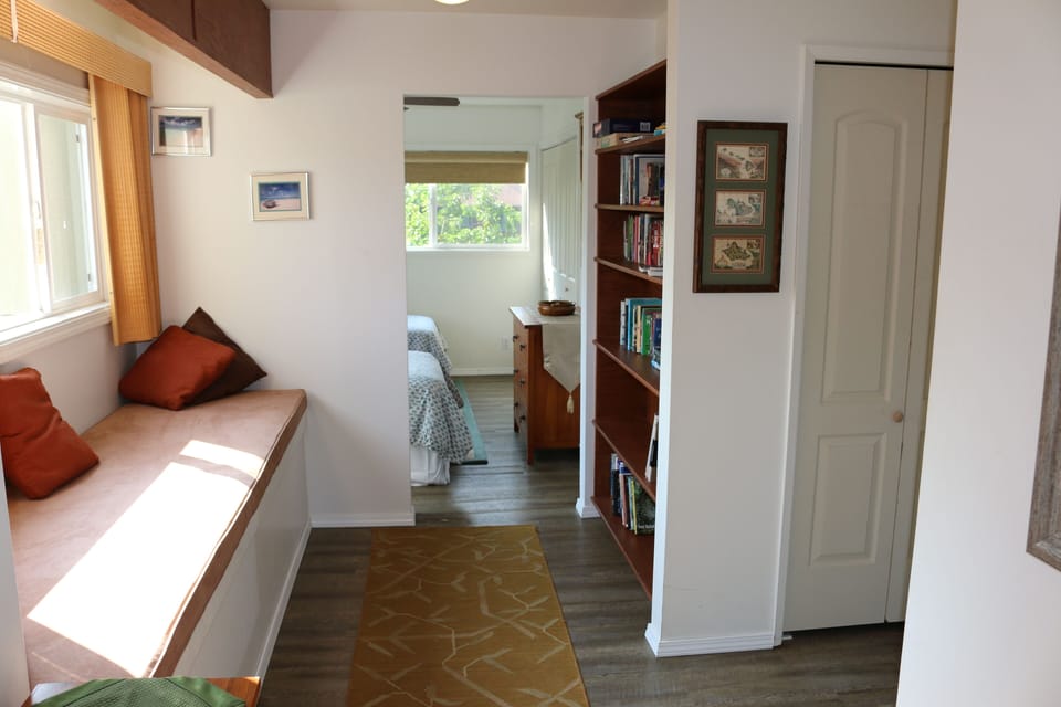 The front door looking in.  Extra large reading nook  (or napping zone).