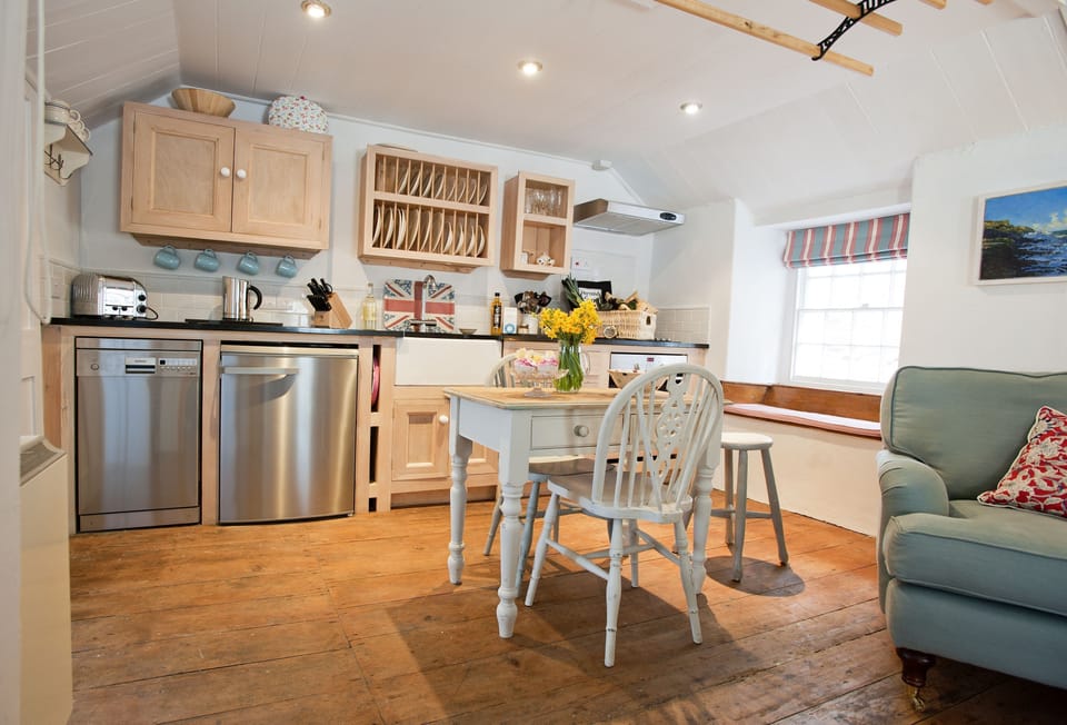 Handmade wooden galley kitchen with granite worktops