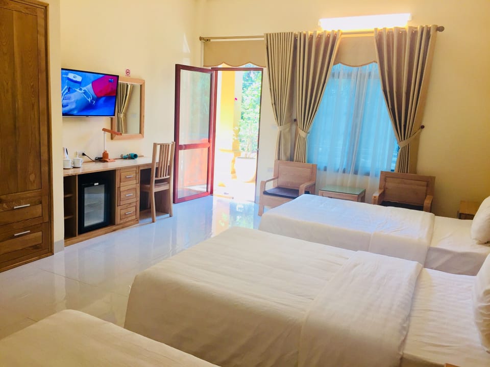Panoramic Triple Room, 1 Bedroom, Courtyard View, Courtyard Area | Minibar, desk, laptop workspace, soundproofing