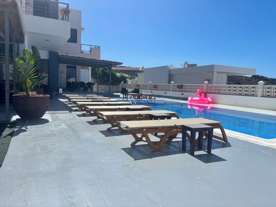 Pool with sun beds