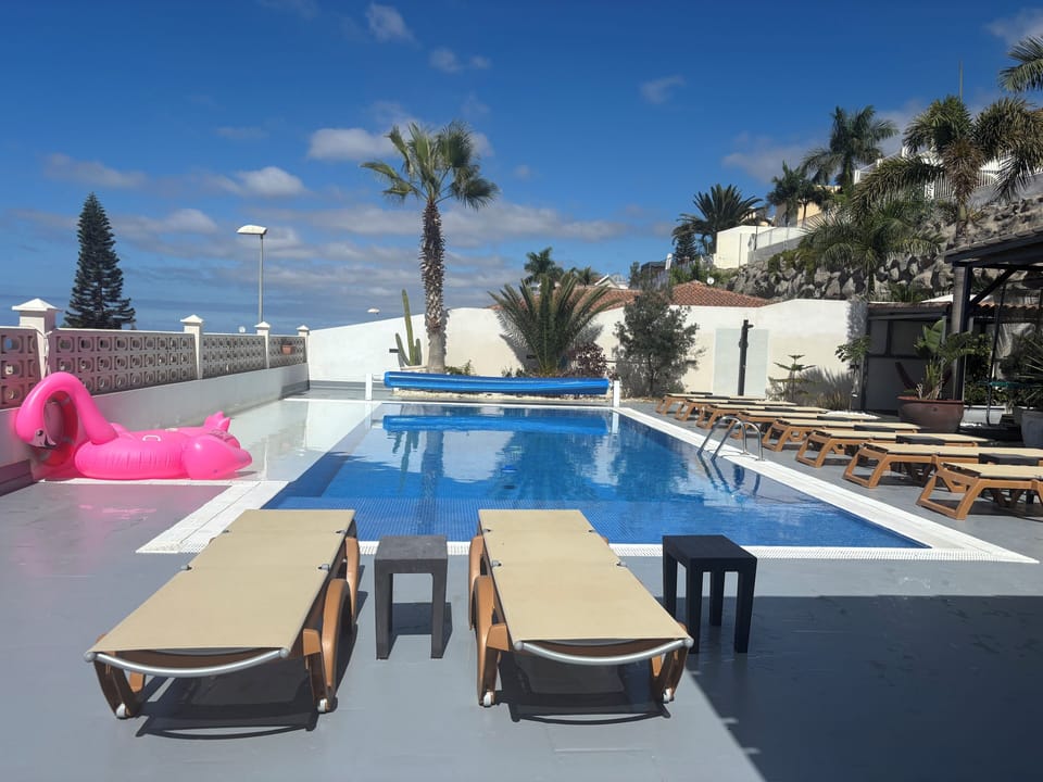 Pool with sun beds