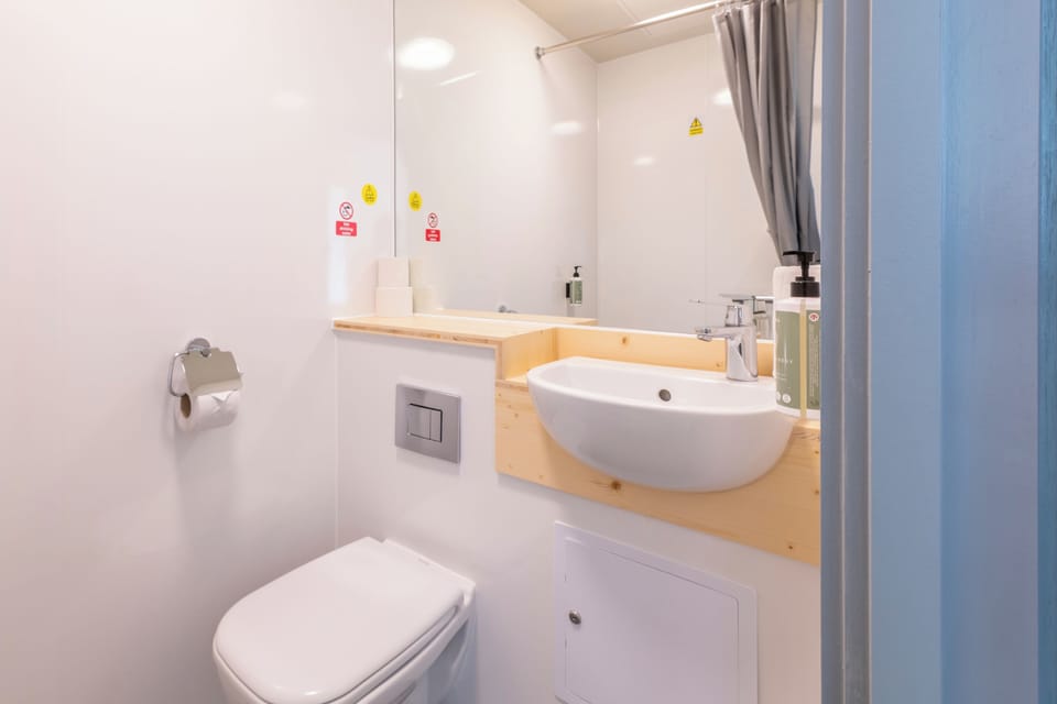 Shower, free toiletries, towels, soap