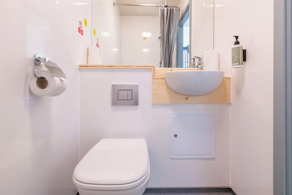 Shower, free toiletries, towels, soap