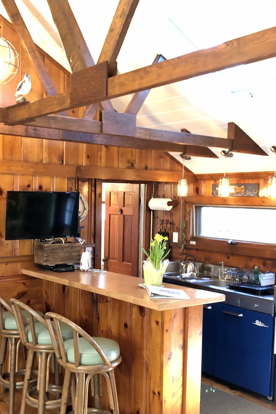 Flat Screen TV Near Breakfast Bar Swivels for Easy Viewing From Many Angles