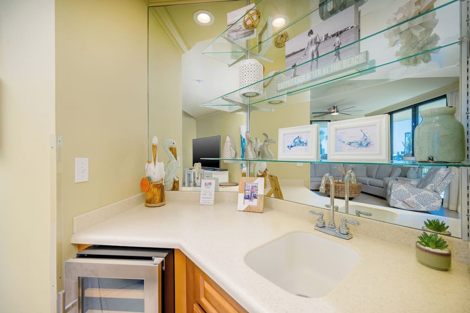 Grab a chilled bottle from the wine cooler or create your favorite cocktail at the wet bar
