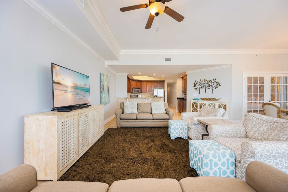 Immerse yourself in comfort on the plush couch, perfect for family movie nights after a day at the coast
