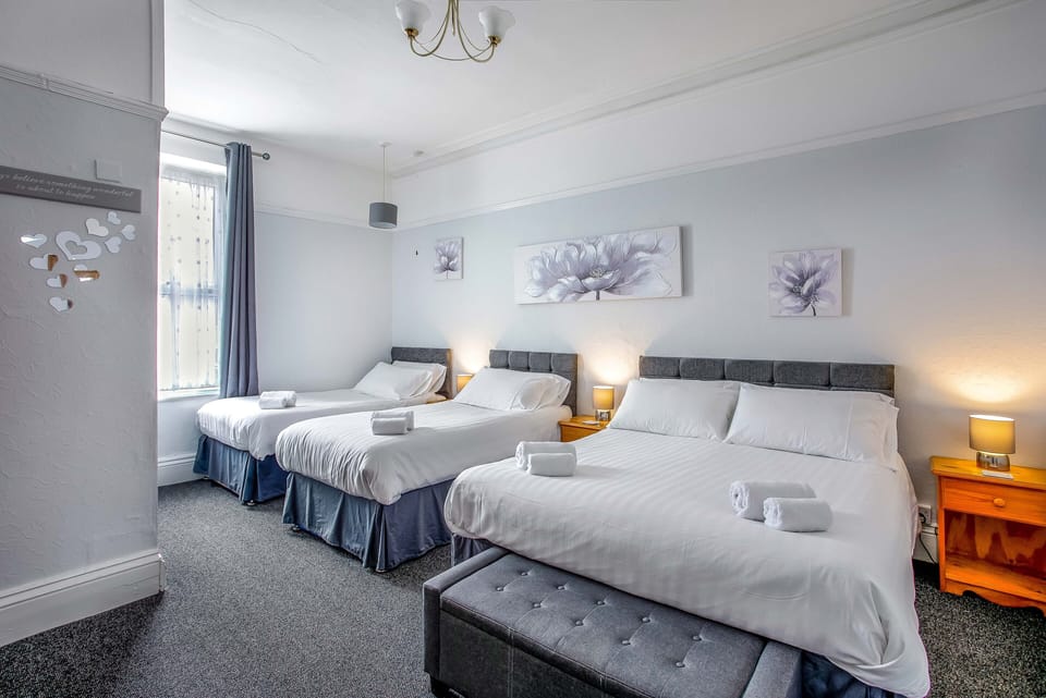 Family Quadruple Room, Ensuite | Premium bedding, desk, blackout drapes, iron/ironing board