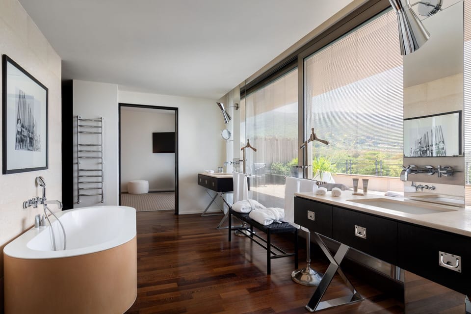 Deluxe Suite, 1 Bedroom, Golf View | Bathroom | Separate tub and shower, free toiletries, hair dryer, bathrobes