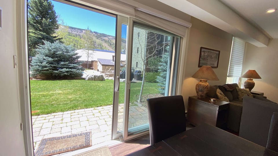 Walk out to patio and pool and hot tub.