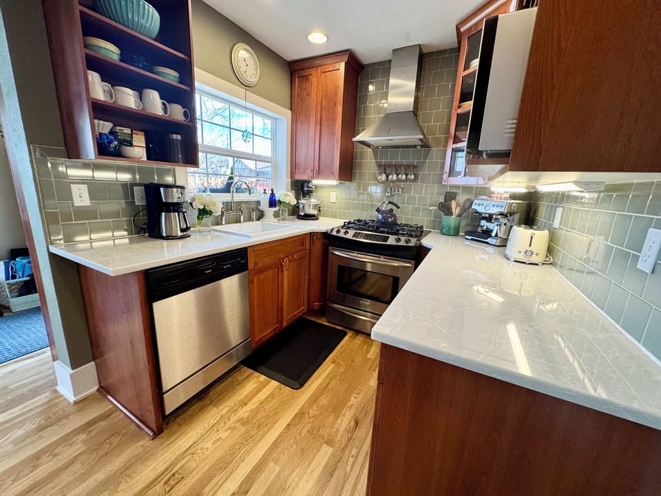 Brand new Quartz countertops, fully stocked kitchen w/ spices