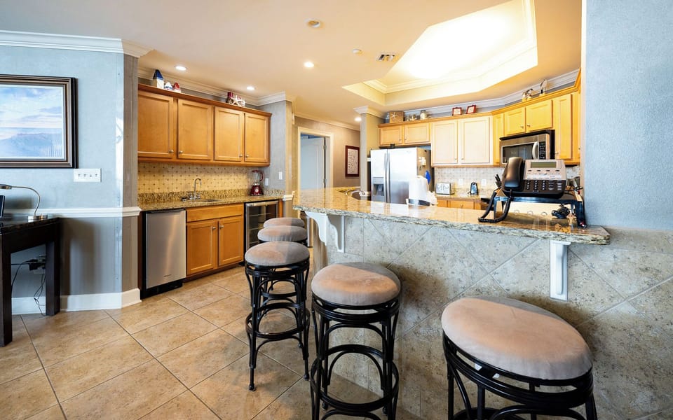 Enjoy your morning coffee at the bar, surrounded by coastal charm while planning your beach day adventures