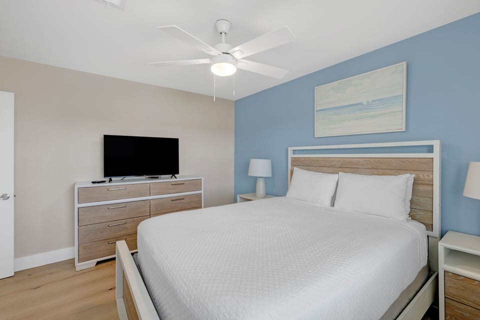Bedroom 3, also located on the first floor has a television and Queen bed - sleeps 2
