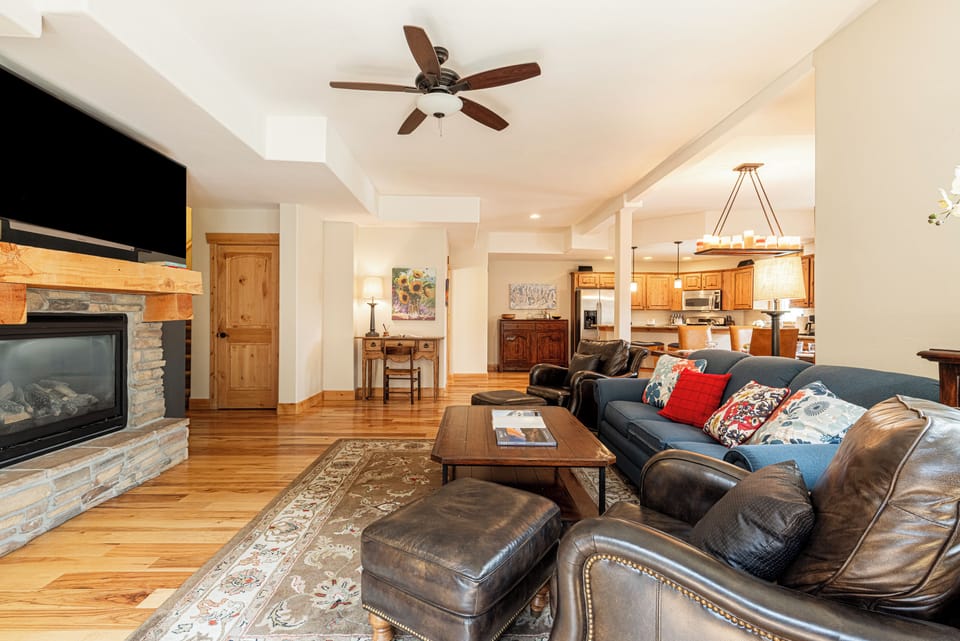 Entry into Living Room with Mountain Furnishings, Gas Fireplace, 60" Samsung Smart TV and Sonos Soundbar