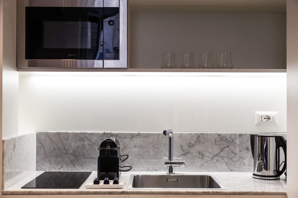 Kitchen with Nespresso coffee machine and microvawe