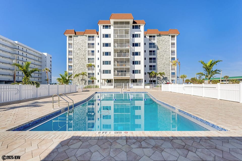 Sand Caper Beachfront Condos with Resort Sized Heated Pool and Sundeck