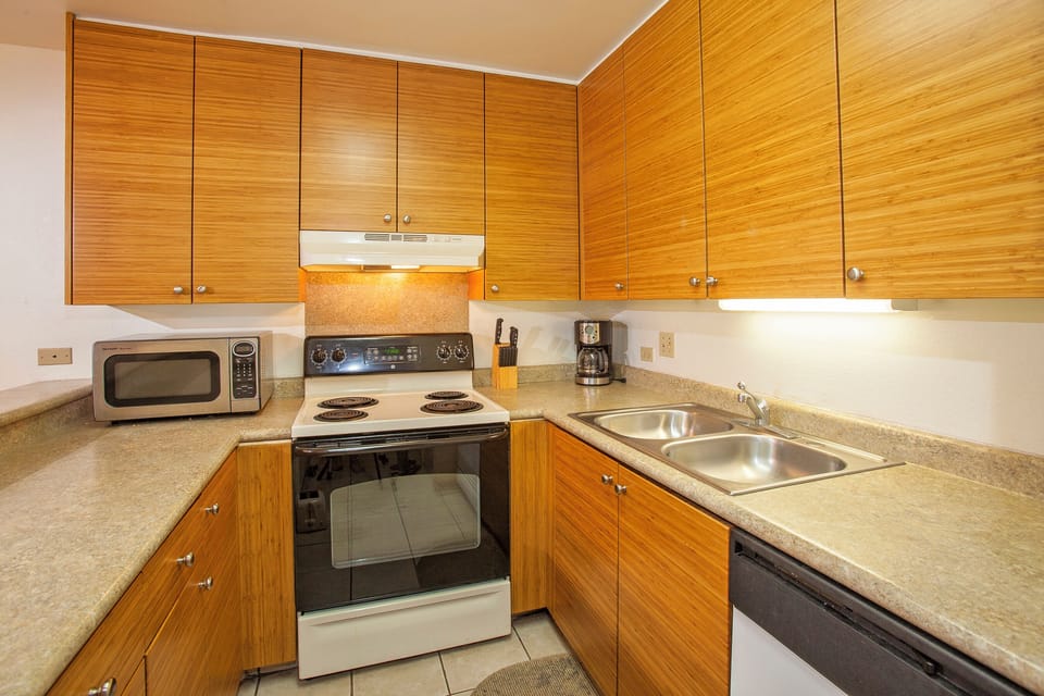 Your fully equipped kitchen has everything you need to prepare meals with sleek granite counters, modern appliances, and ample cabinet space for easy, comfortable cooking.
