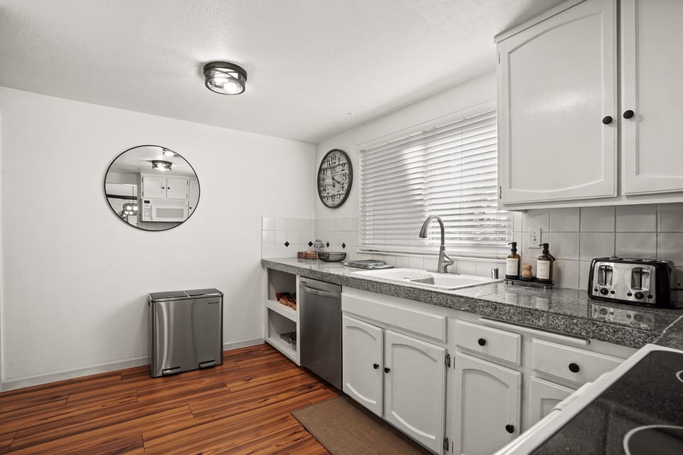 A bright and functional kitchen designed for everything from slow mornings to wine paired dinners