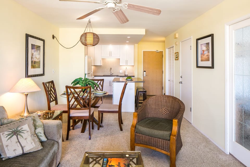 Sink into the island breeze as you relax in your open-concept space, where warm tropical touches meet modern comfort and ease.
