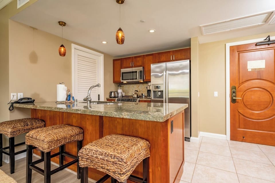 Step into a kitchen that inspires island-style entertaining