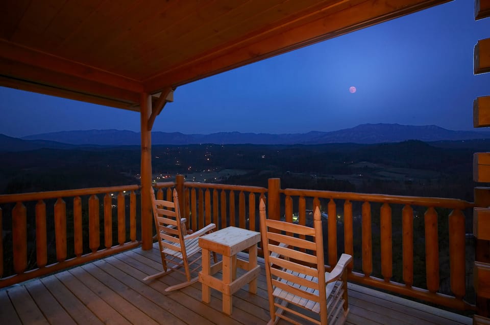 Relax on a porch rocker and take in the views on your covered de