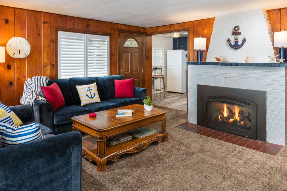 Cozy Livingroom - Gas fireplace, big screen tv and plush new furnishings await.