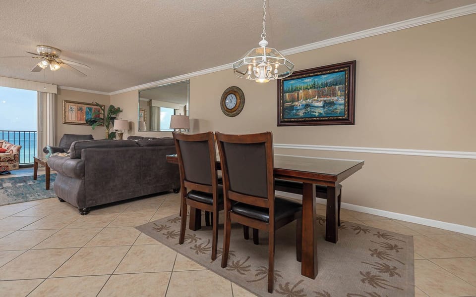 Sit down to a home-cooked meal at your dining table while the gulf sparkles just beyond the living room window