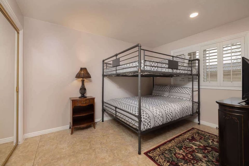 3rd bdrm with queen over queen bunk beds