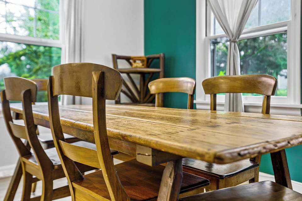 Enjoy meals at the vintage wooden table and chairs, full of character and charm. Perfect for cozy dining and quality time with loved ones.