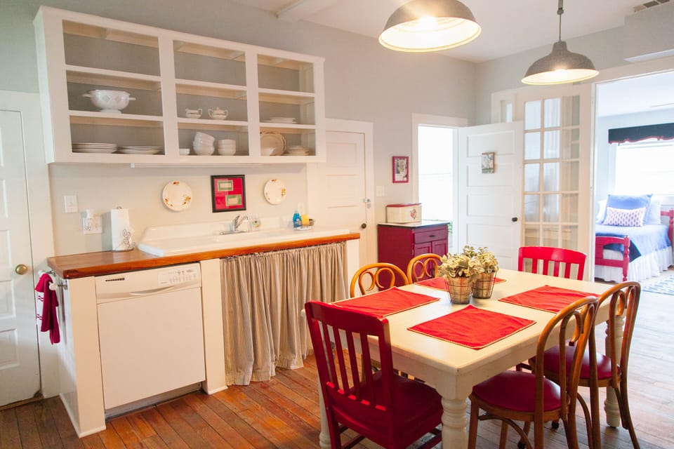 Walking in the front door, you're immediately in the kitchen/dining room/the past. Light paint with bright details makes you feel like you've steppe into a different time.