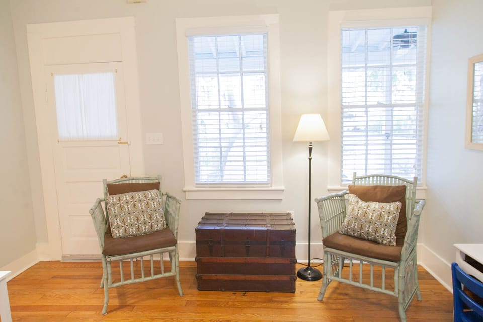 Come and sit right here. Screened in porch is right outside if you need more sunlight.