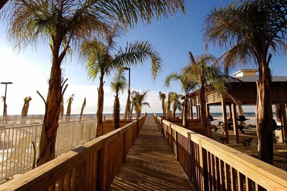 The gorgeous boardwalk leads you to the beautiful Orange Beach! THIS is what vacation is all about!