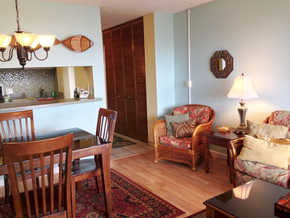 Unwind in your comfortable living space where tropical charm meets home comfort. Relax in cozy rattan seating or gather at the dining table after a day of island adventures.