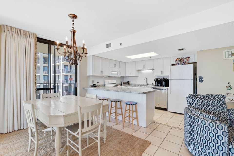 Dining Table for 6 and Upgraded Kitchen with Granite Countertops and Seating at the Breakfast Bar