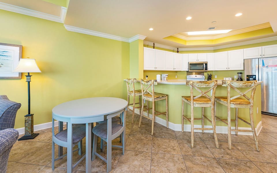 Kick back at the breakfast bar while scents from the coffee maker fill the air