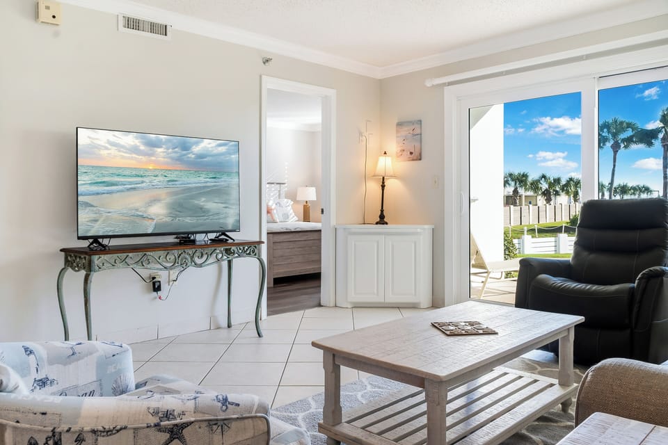 The Islander Vacation Rental 101 Living Area with TV