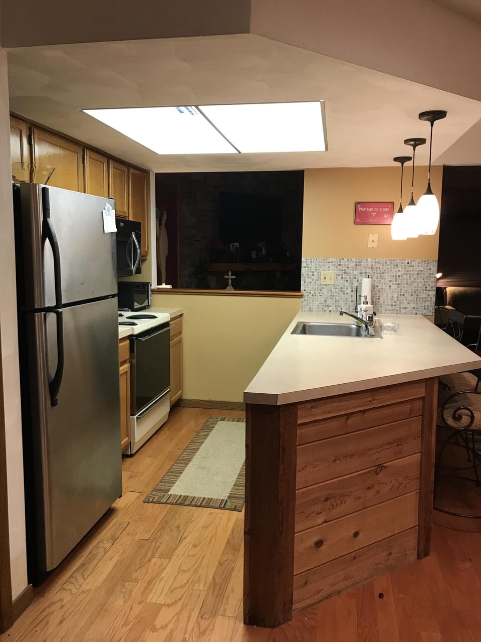 view of kitchen from front door